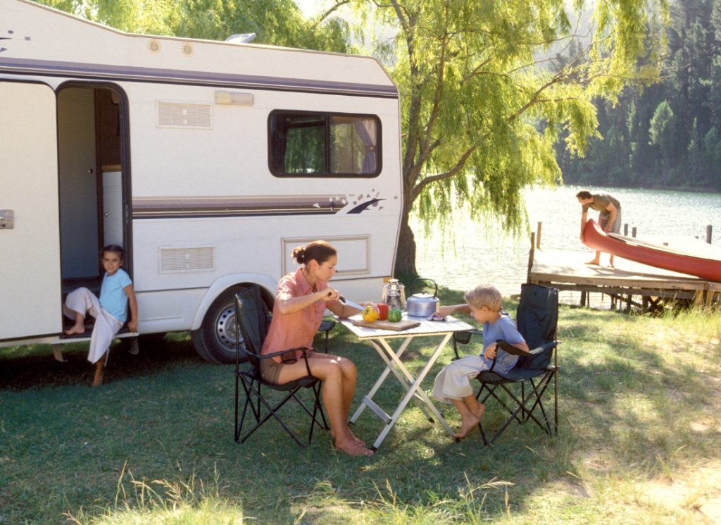 family rv next to river